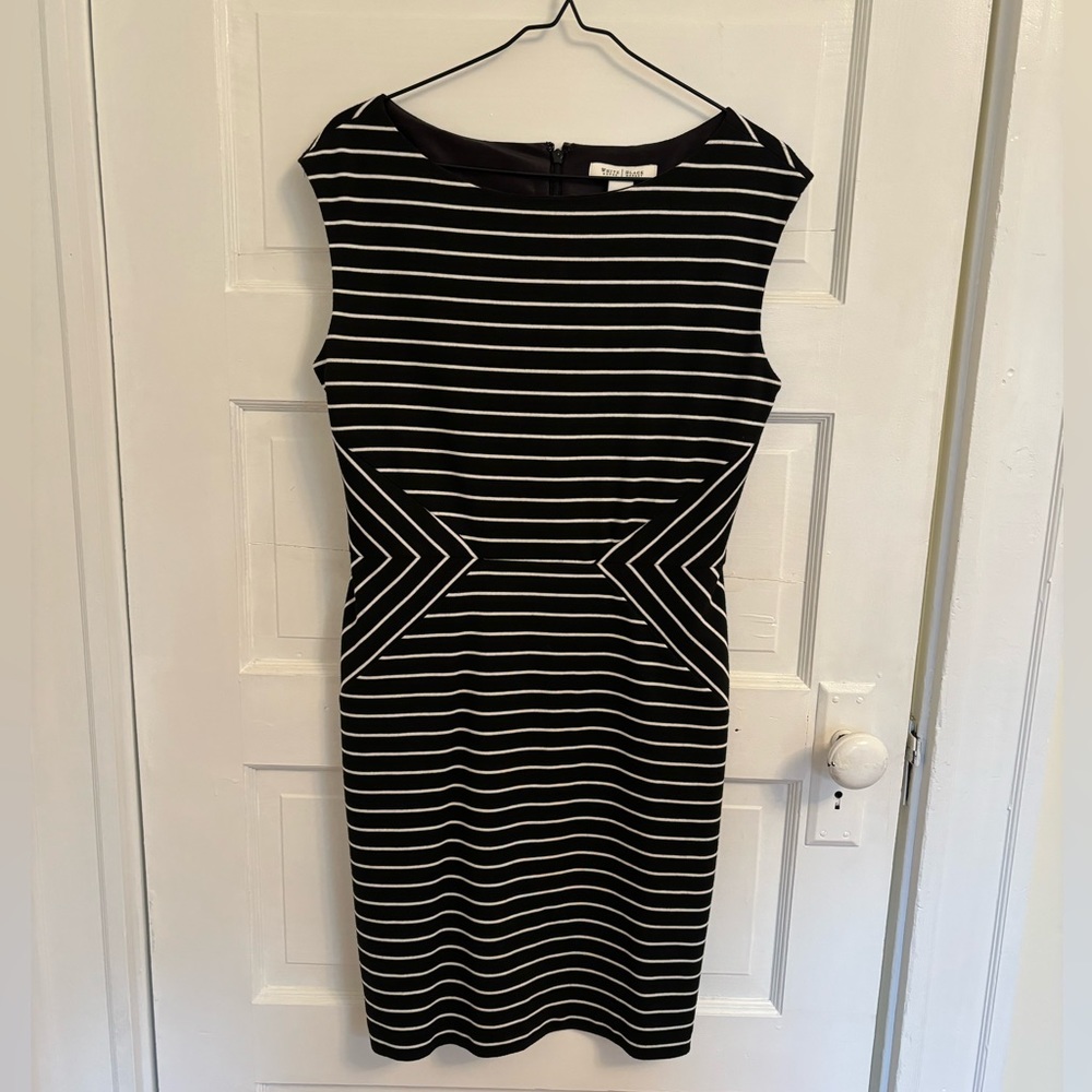 White and black striped semi-fitted dress.